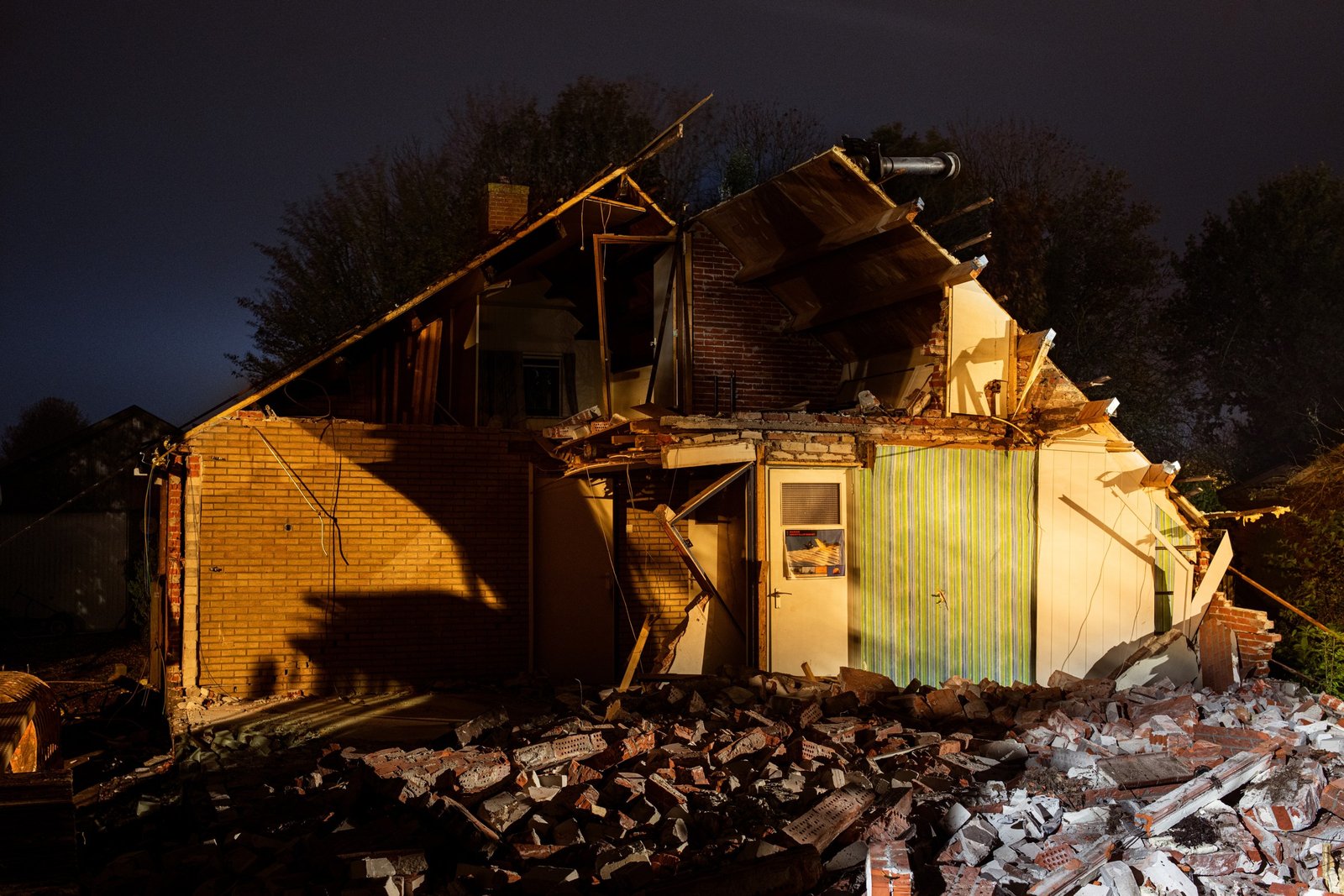 A house in Overschild at night, opened by demolition