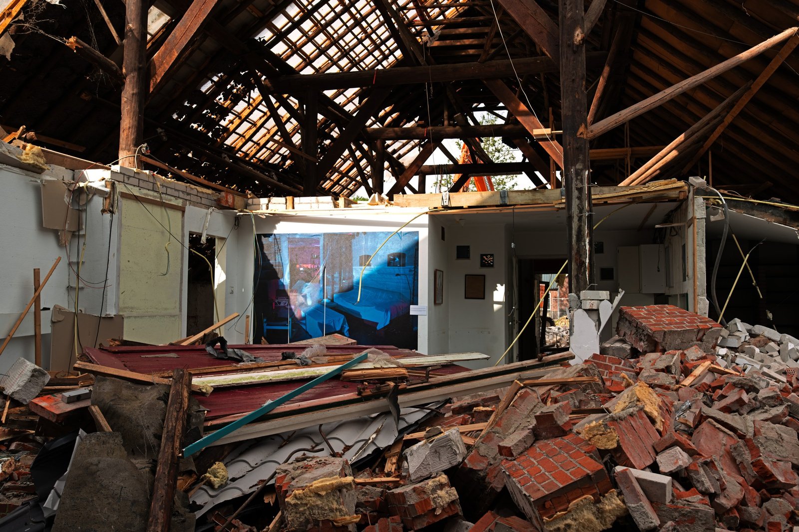 The exposed interior of a demolished house